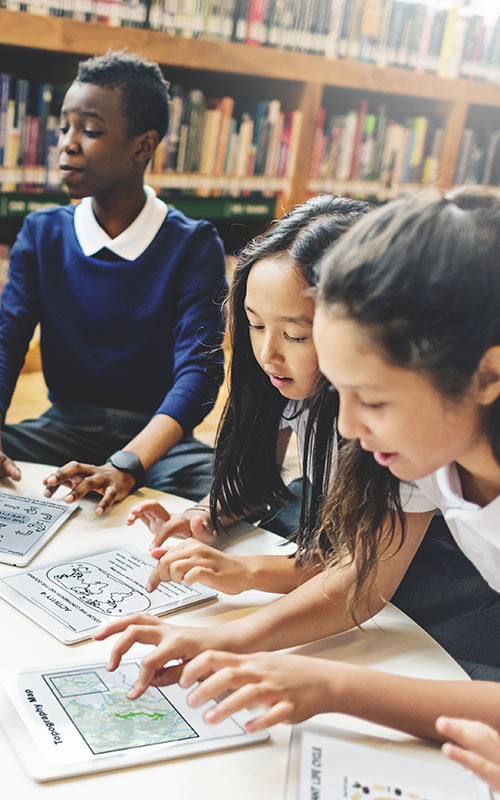 students on tablets