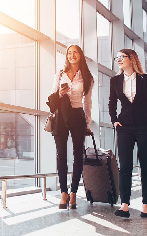 two businesspeople at the airport