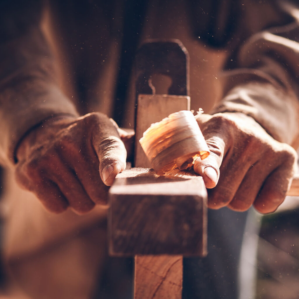 woodworker cutting wood